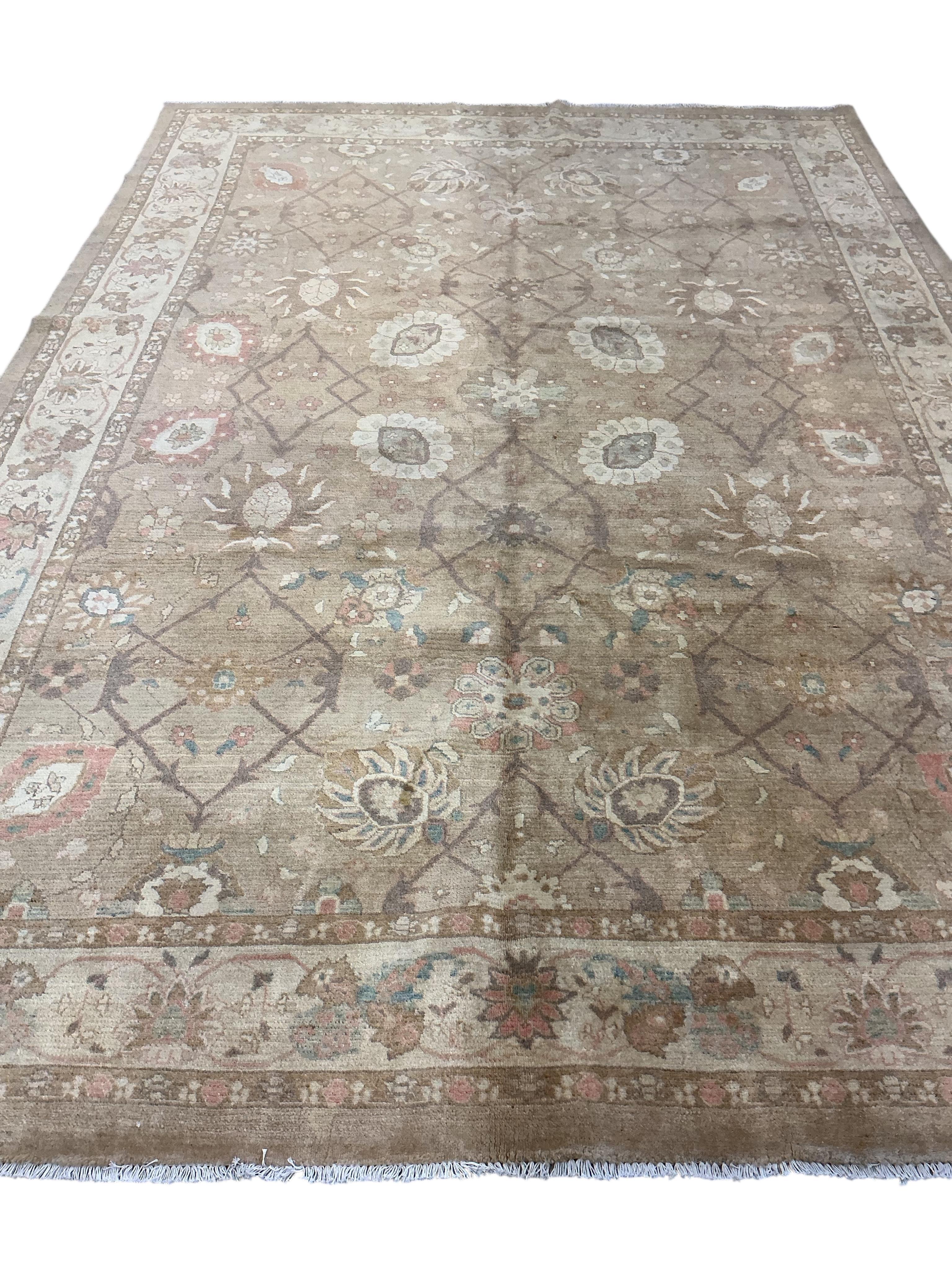 A Persian carpet, 370 x 255cm